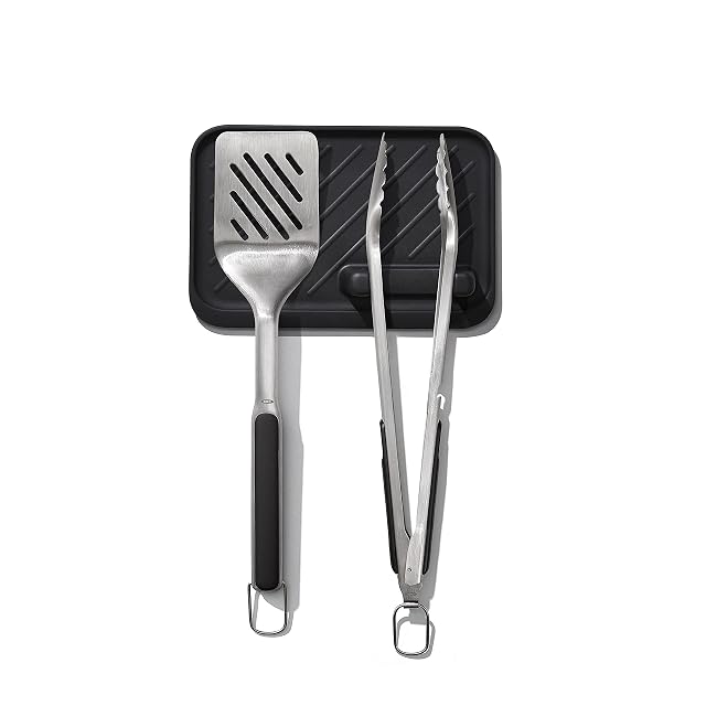 OXO Outdoor 3-piece grilling tool set with turner tongs and silicone tool rest