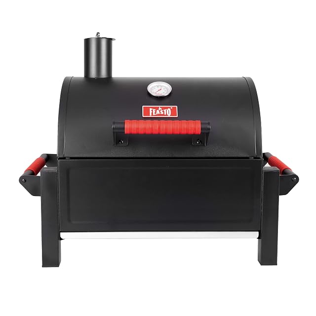 Feasto portable tabletop charcoal grill with cast iron grates and warming tier
